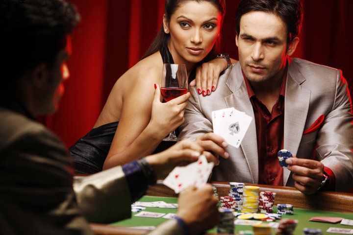 Live AduQ table at wika123 with professional dealer, card display, and betting interface